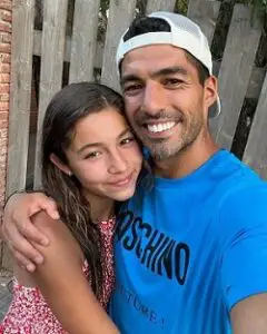 Delfina Suarez with her father