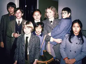 Mia Farrow with her children