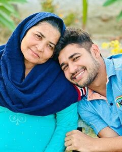 Naveen Kumar with his mother