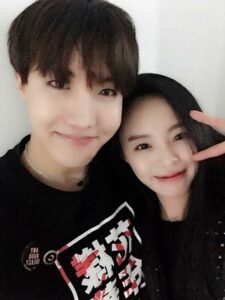 J Hope with his sister