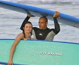 Kelly Slater with his girlfriend Cameron 