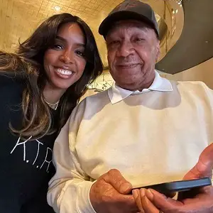 Kelly Rowland with her father