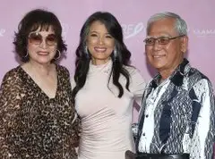 Kelly Hu with her parents
