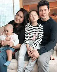 Iko Uwais with his wife Audy & daughter