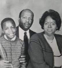 John Lewis with his wife & son