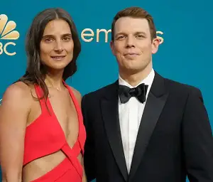Jake Lacy with his wife