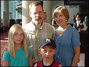Peter Ostrum with his wife & kids