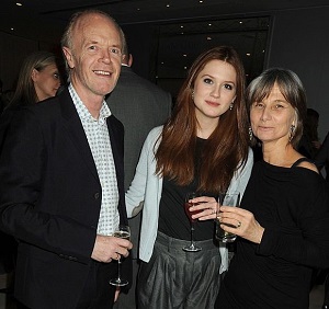 Bonnie Wright with her parents