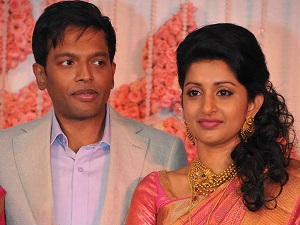 Meera Jasmine with her husband
