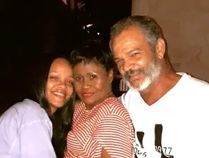 Rihanna with her parents