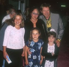 John Doe with his wife & Daughters